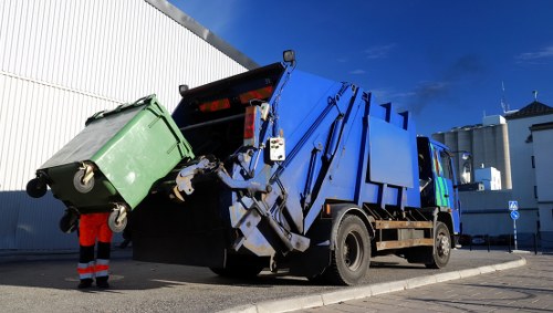 Queenspark community participating in waste removal