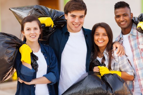Photograph representing house clearance in Queens Park, team preparing residence