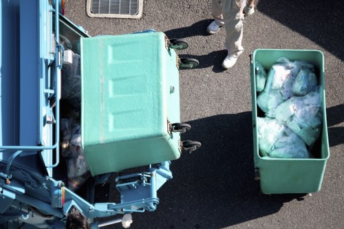Recycled materials stacked at a local transfer station serving Queens Park